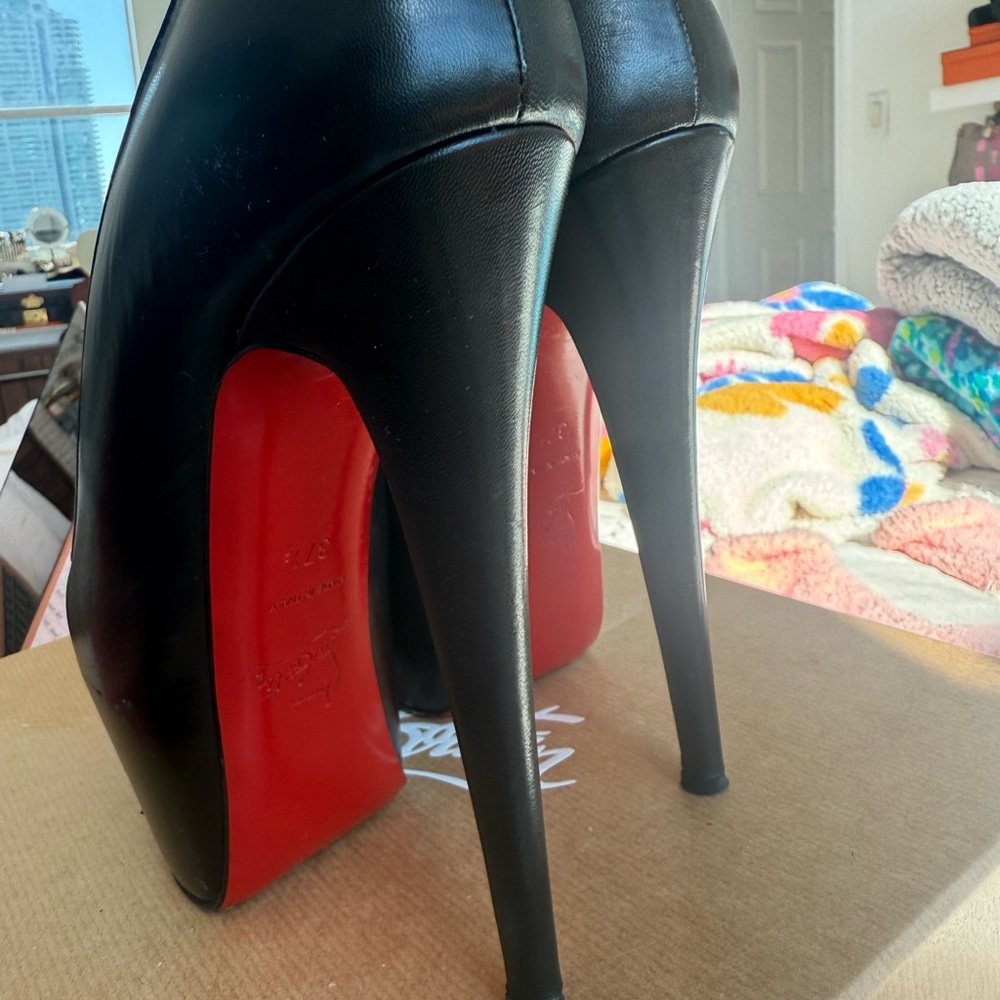 Christian Louboutin Black Heels with Signature Red Soles